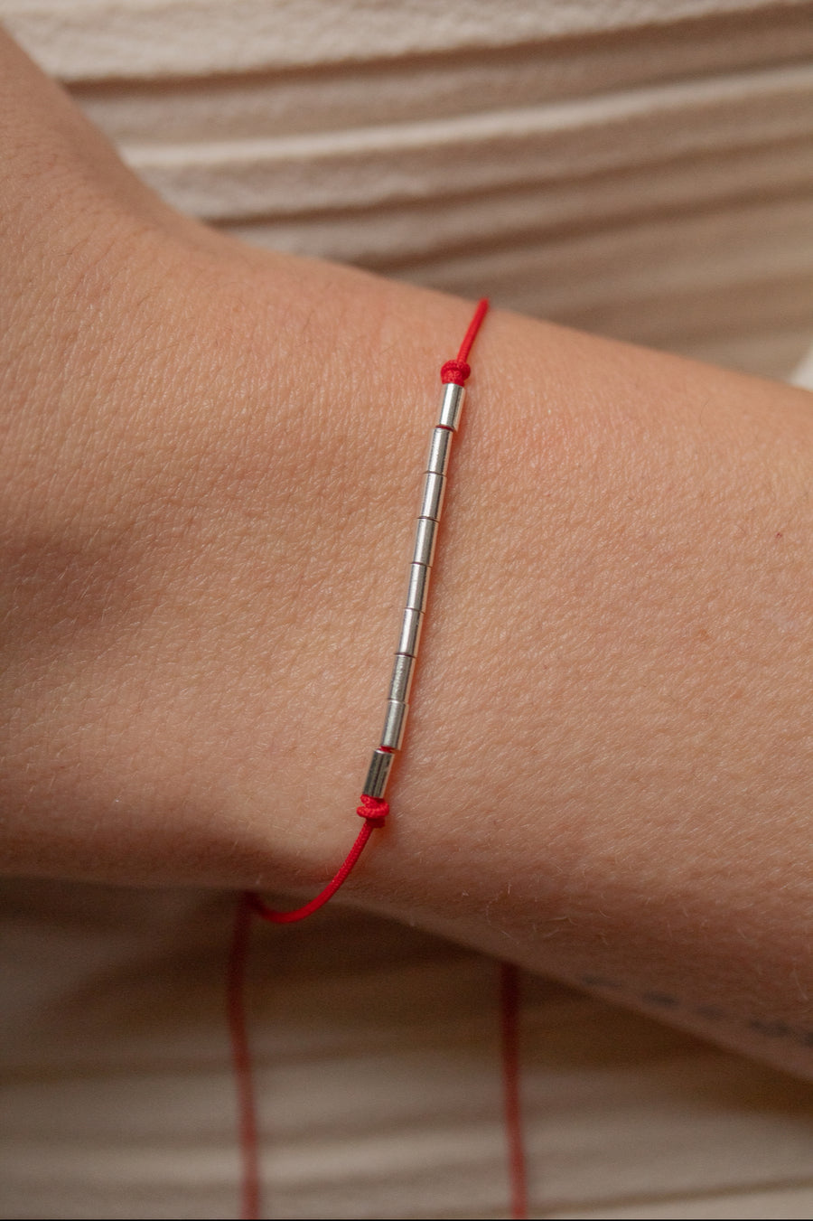 pulseira regulável vermelha